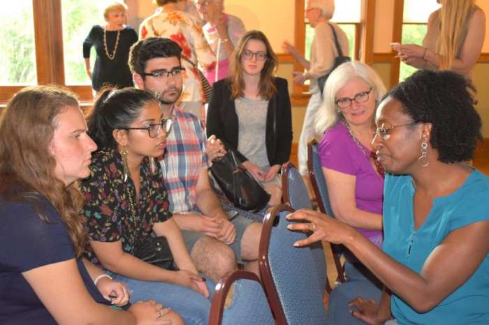 Dr. Michener talking with audience members after her presentation.  Photo by Alessandro Powell.